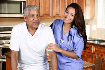  Home health care worker and an elderly man